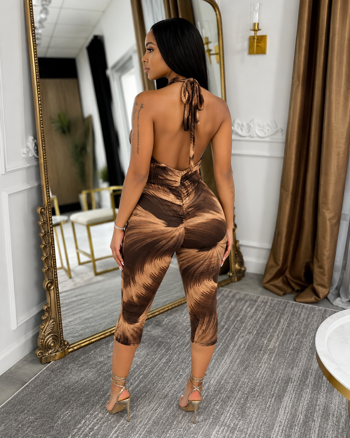 HALTER OPEN BACK ZEBRA CAPRI JUMPSUIT